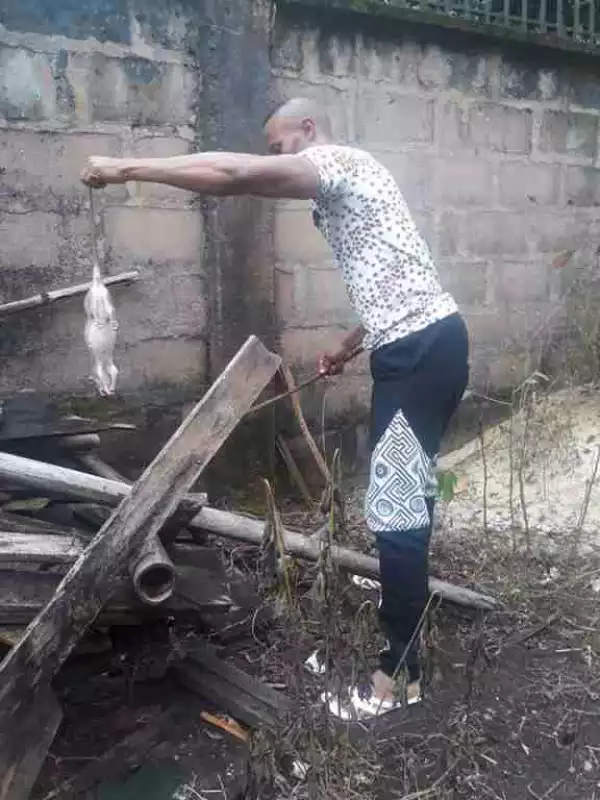 Young Man Makes Pepper Soup With Bush Rat After Hunting It Down (Photos) 